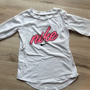 Nike Kids Long Sleeve Tee in White with Pink Logo